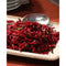 Grated and spiced beetroot salad on a decorative plate.