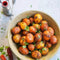 Ina Paarman Potato Spice with seasoned baby potatoes in a bowl.