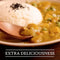 Tastic Long Grain Parboiled White Rice served with a creamy curry, highlighting fluffy texture and rich flavor.